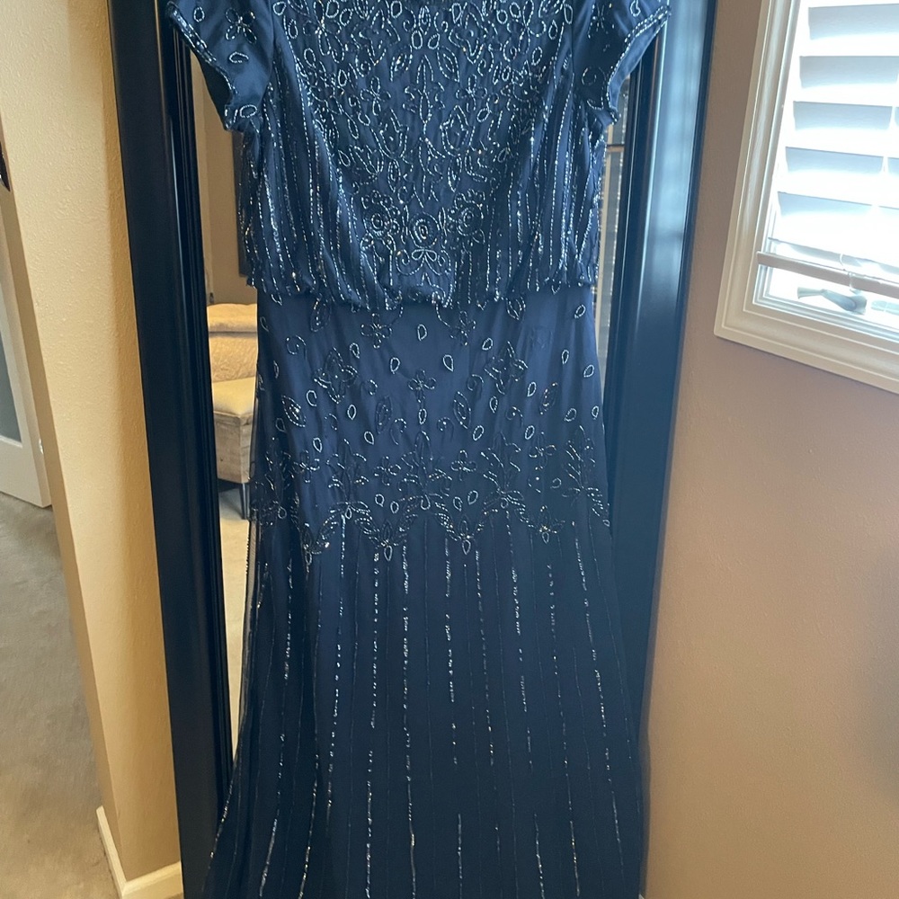 Navy blue , long to the floor dress.